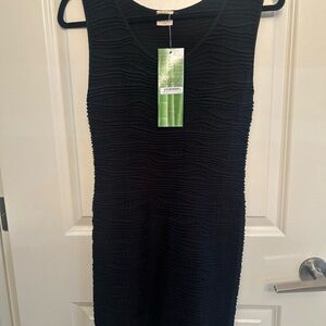 Pleated sleeveless little black dress woman’s size medium body contoured